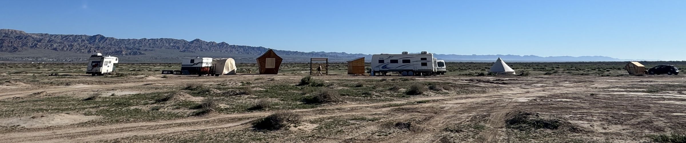 Panoramic view of the Freeside camp in the desert